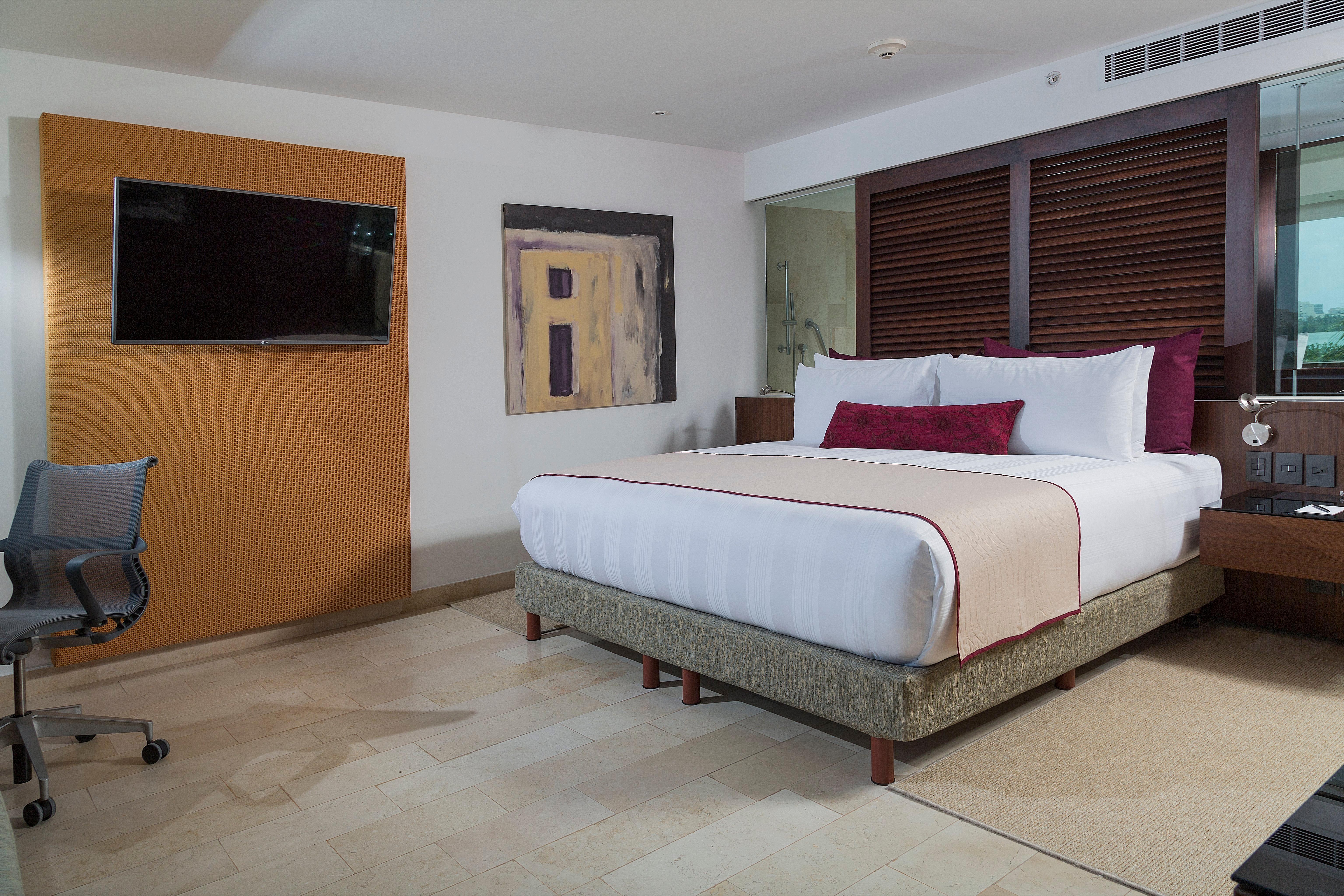 Presidente Intercontinental Cancun Resort Bagian luar foto A bedroom at the hotel