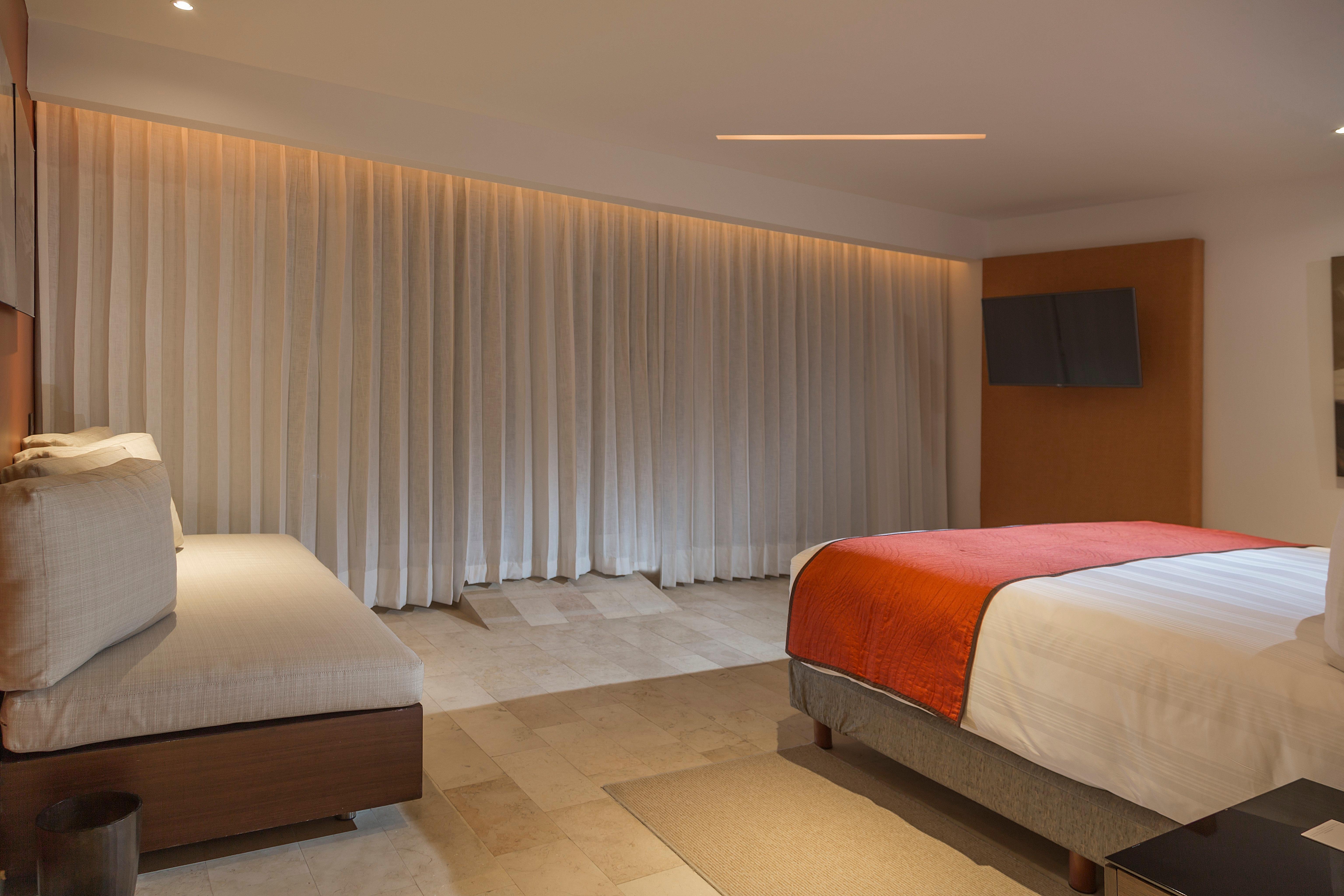 Presidente Intercontinental Cancun Resort Bagian luar foto A bedroom at the hotel