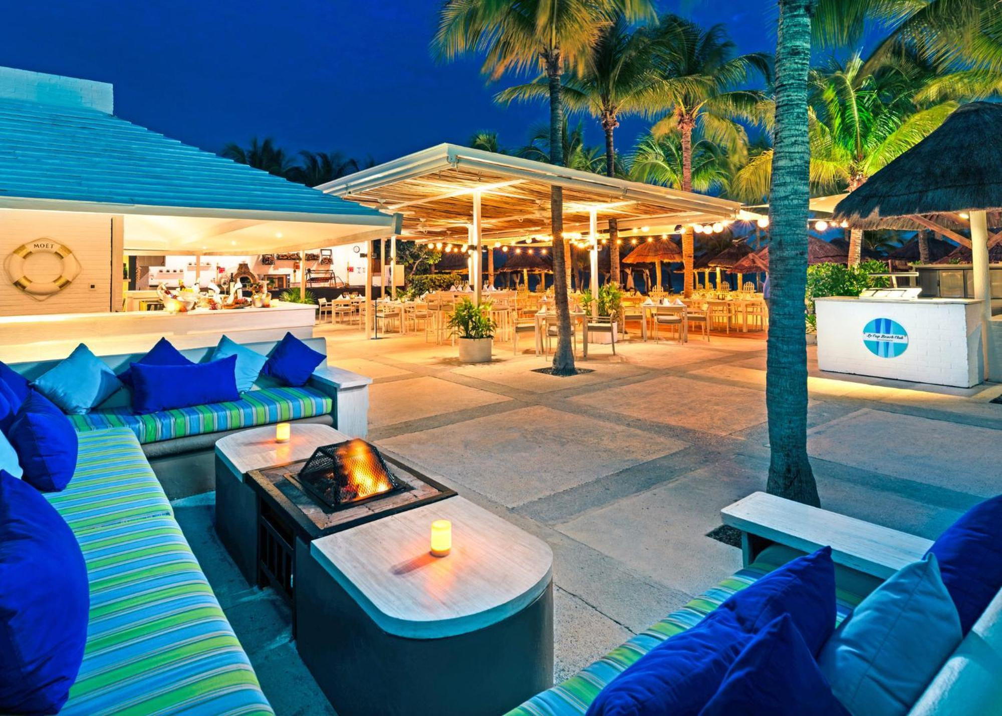 Presidente Intercontinental Cancun Resort Bagian luar foto The Beach Club at The Palms